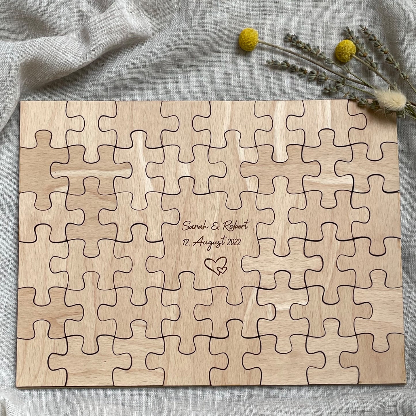 Puzzle aus Holz zur Hochzeit personalisiert als Gästebuch zum unterschreiben